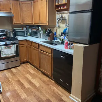 Kitchen remodel on Atlantic Avenue, Brooklyn, featuring modern cabinetry, quartz countertops, and stainless steel appliances—an example of home renovation and remodeling in Brooklyn that blends style and functionality