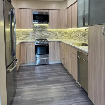 After kitchen remodel on Atlantic Avenue, Brooklyn, showcasing updated cabinetry, sleek quartz countertops, and stainless steel appliances—highlighting quality home renovation and remodeling in Brooklyn