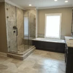 Luxury bathroom remodeling in Brooklyn with dual sinks, marble accents, and custom lighting for a refined, upscale look